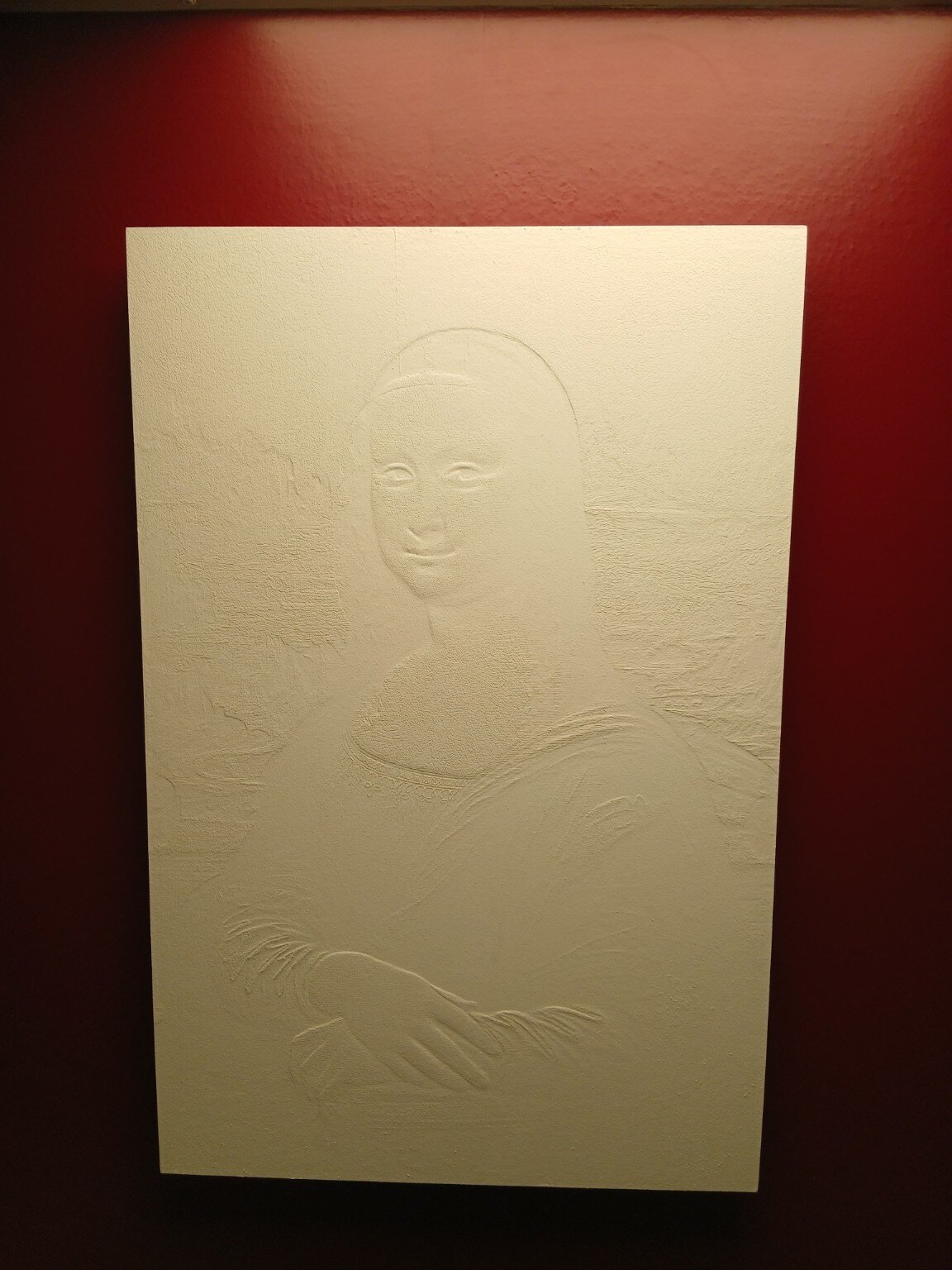 Monochrome bas-relief artwork from the ANAMORPHIA collection
